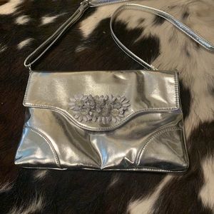 Silver purse with flowers